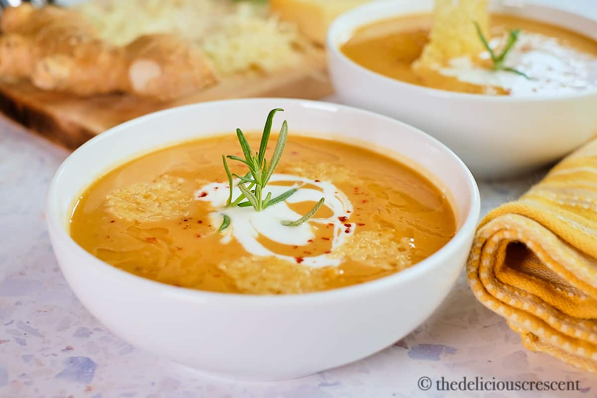 Roasted sweet potato soup topped with parmesan crisps.