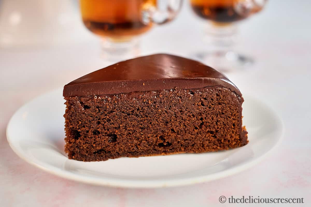 Close up view of almond flour chocolate cake wedge.