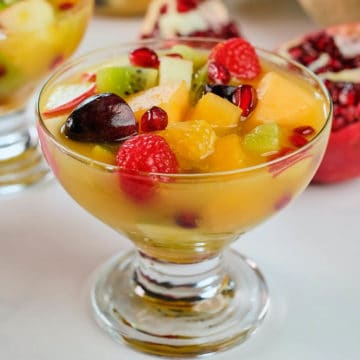 Close view of a bowl full of fruit salad.