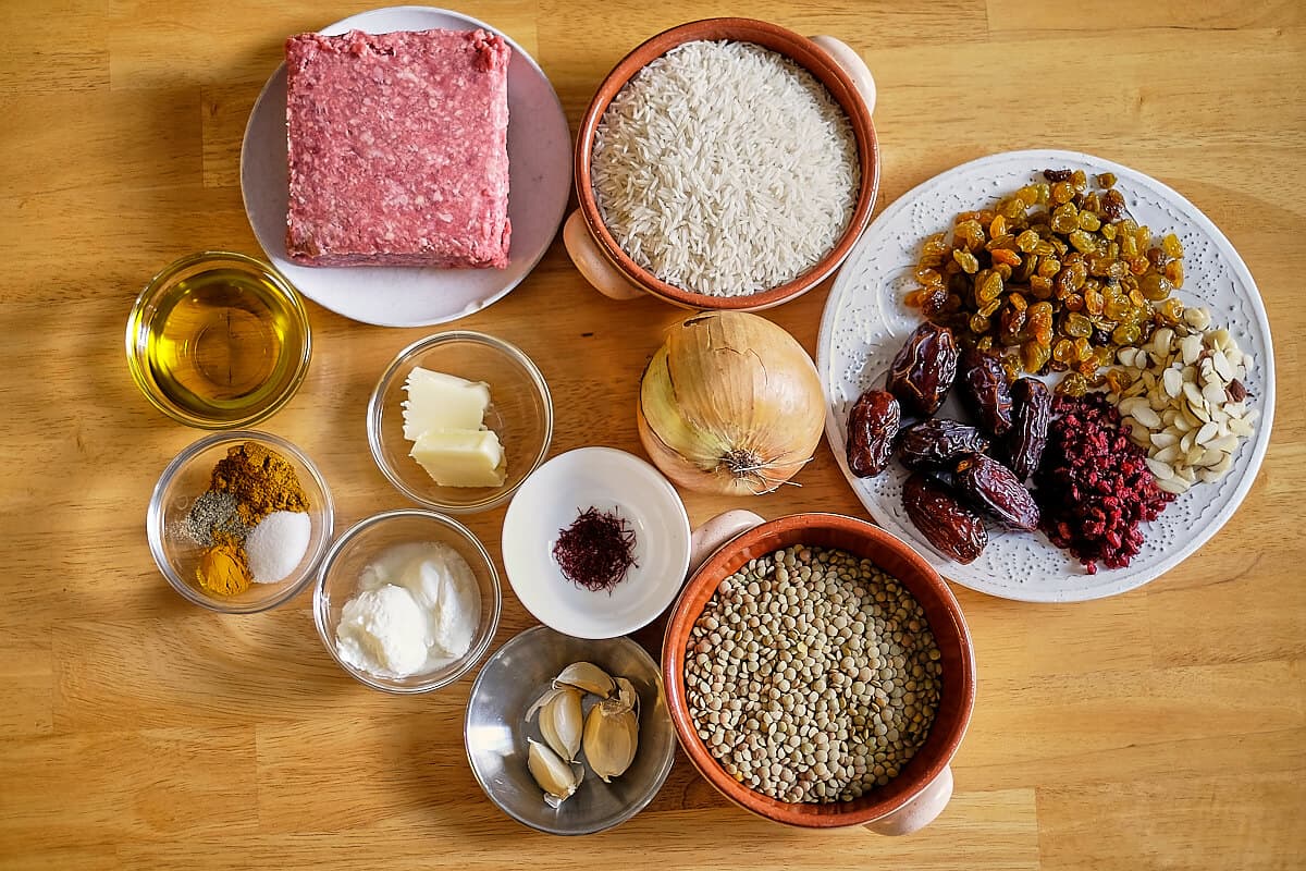 Adas polo ingredients, including meat on table.