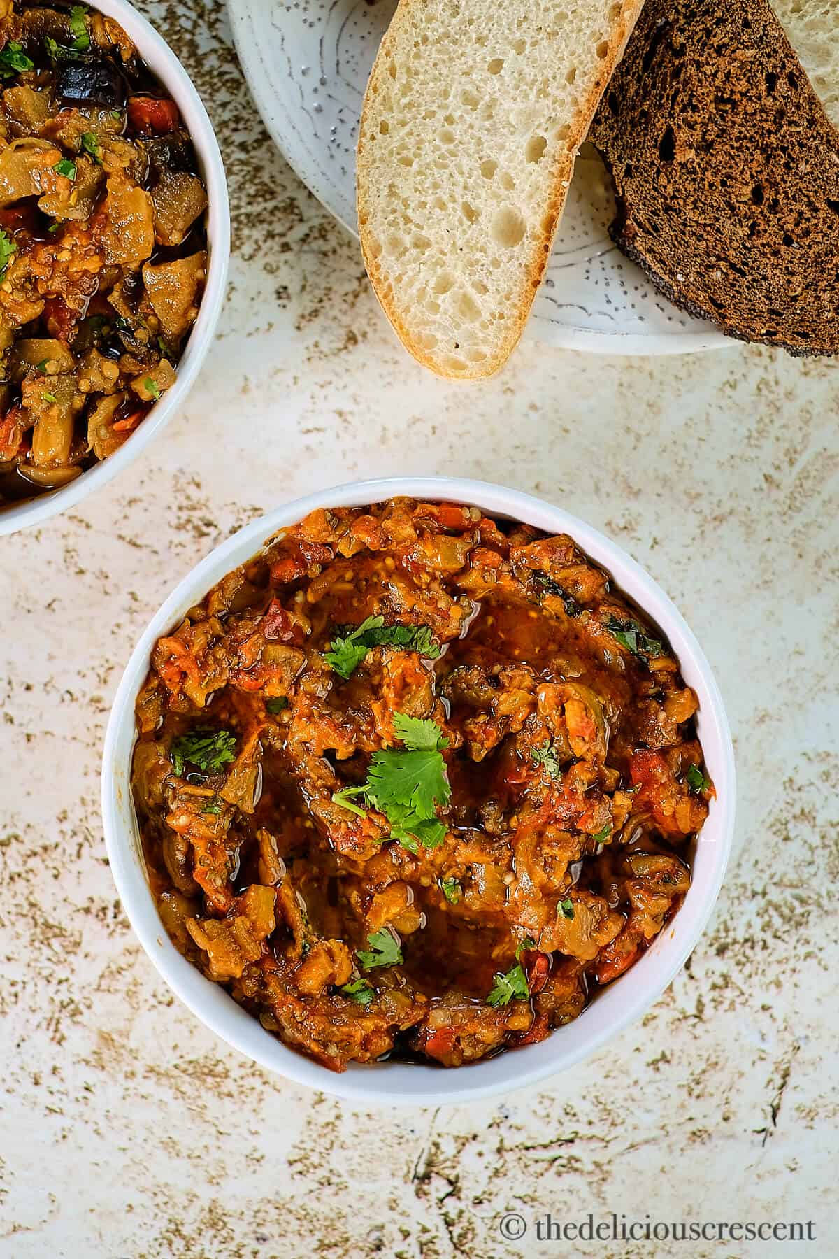 Top view of zaalouk (eggplant dip) served on a table.