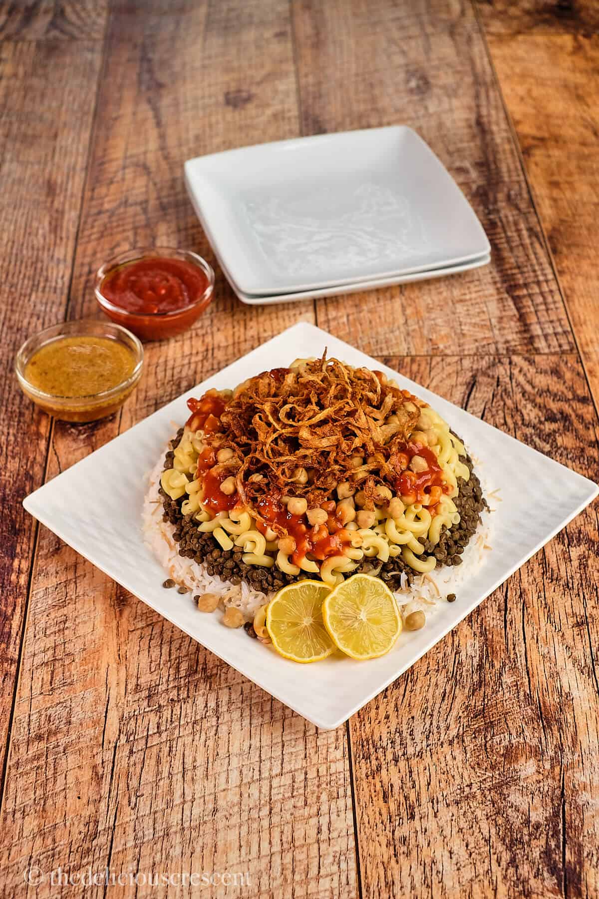 The popular Egyptian national dish served in a plate with delicious sauces.