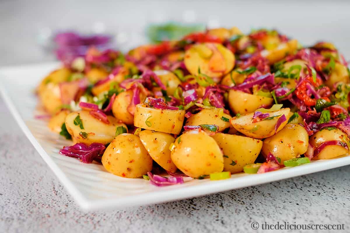 Side view of warm potato salad.