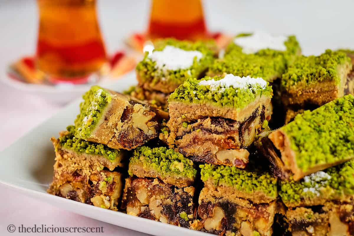 Several pieces of Persian date walnut sweet on a plate.