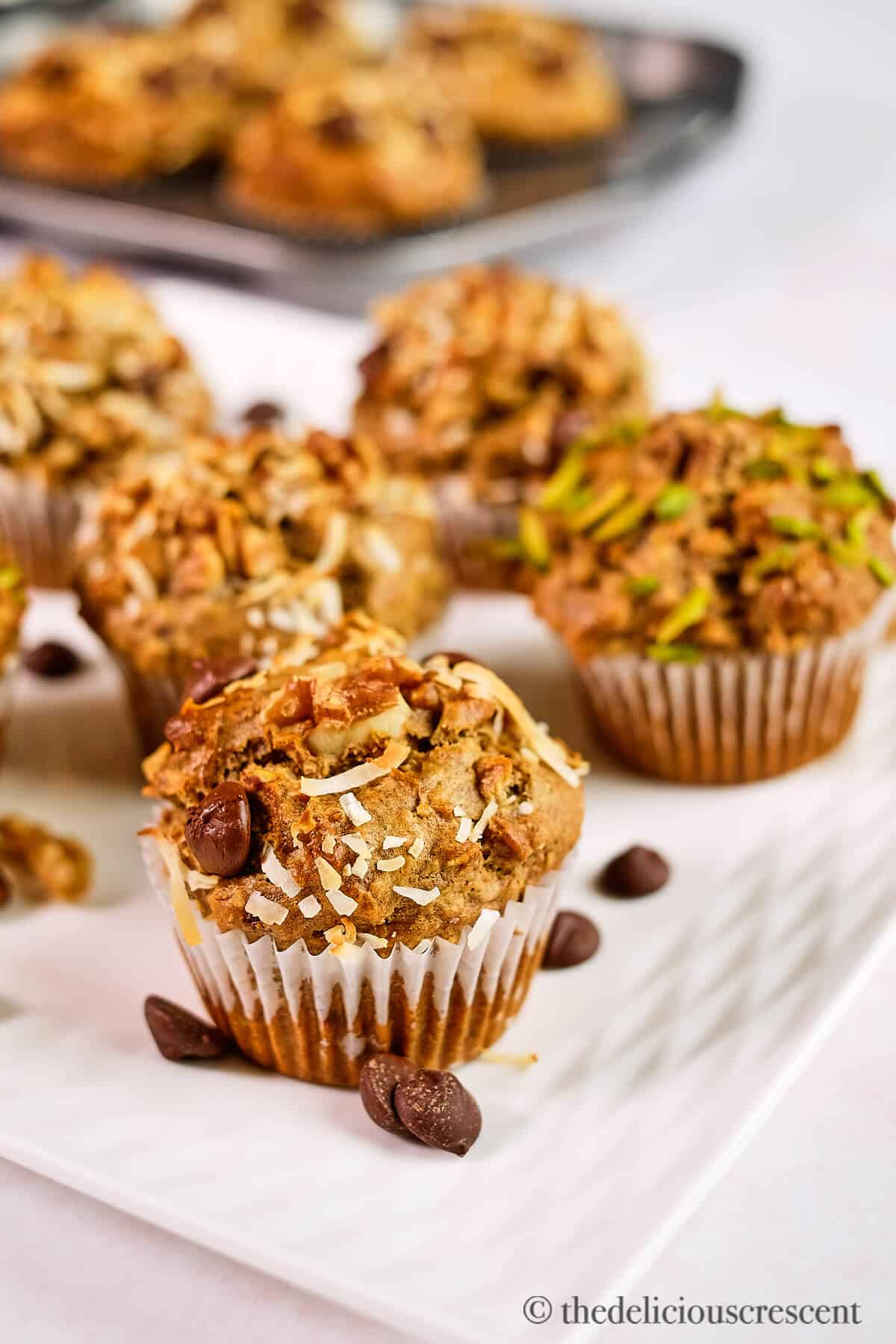 Baked healthy banana muffins on a plate.