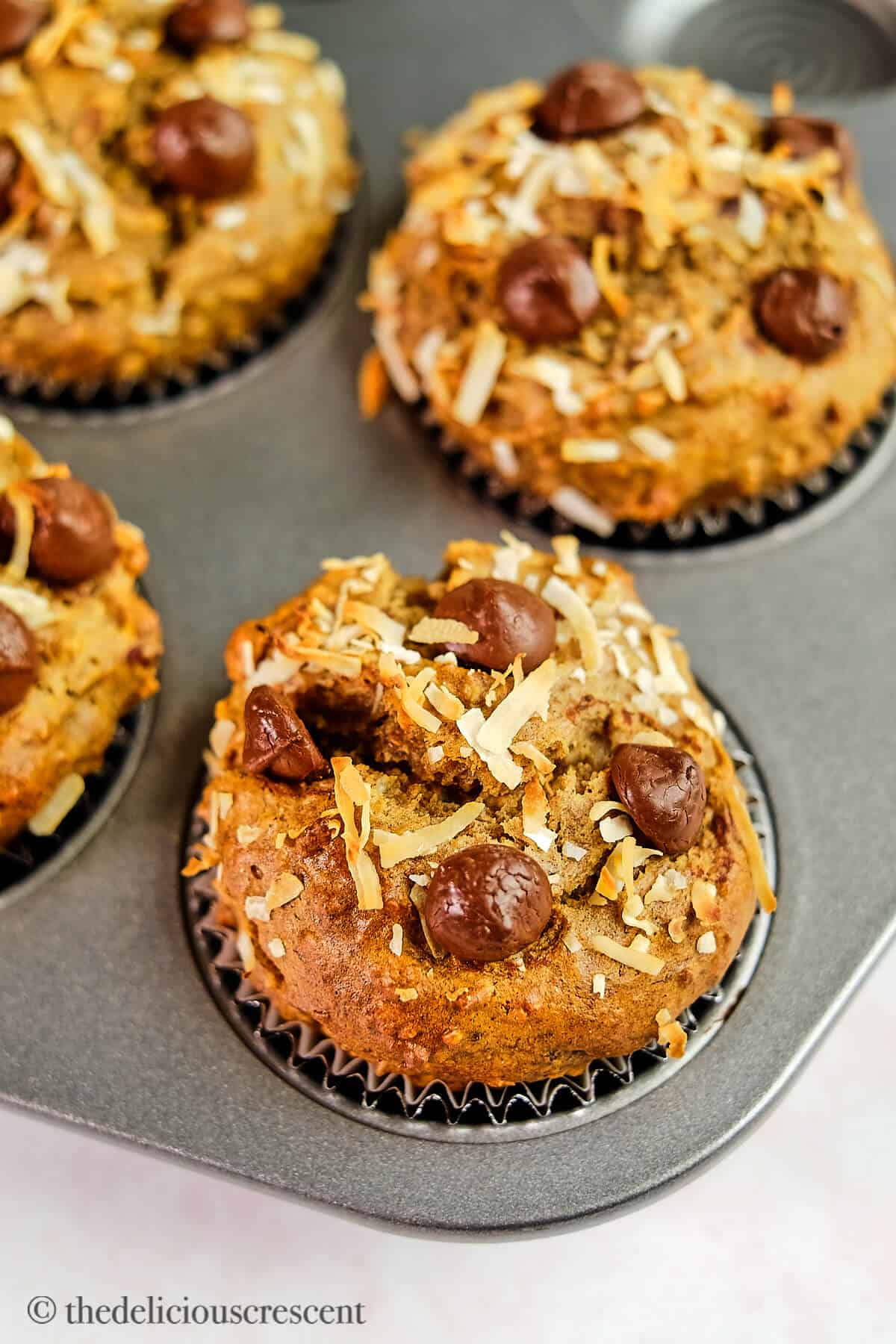 Muffins sweetened with dates and baked with toppings.