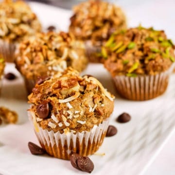 Close up view of healthy banana muffins on a plate.