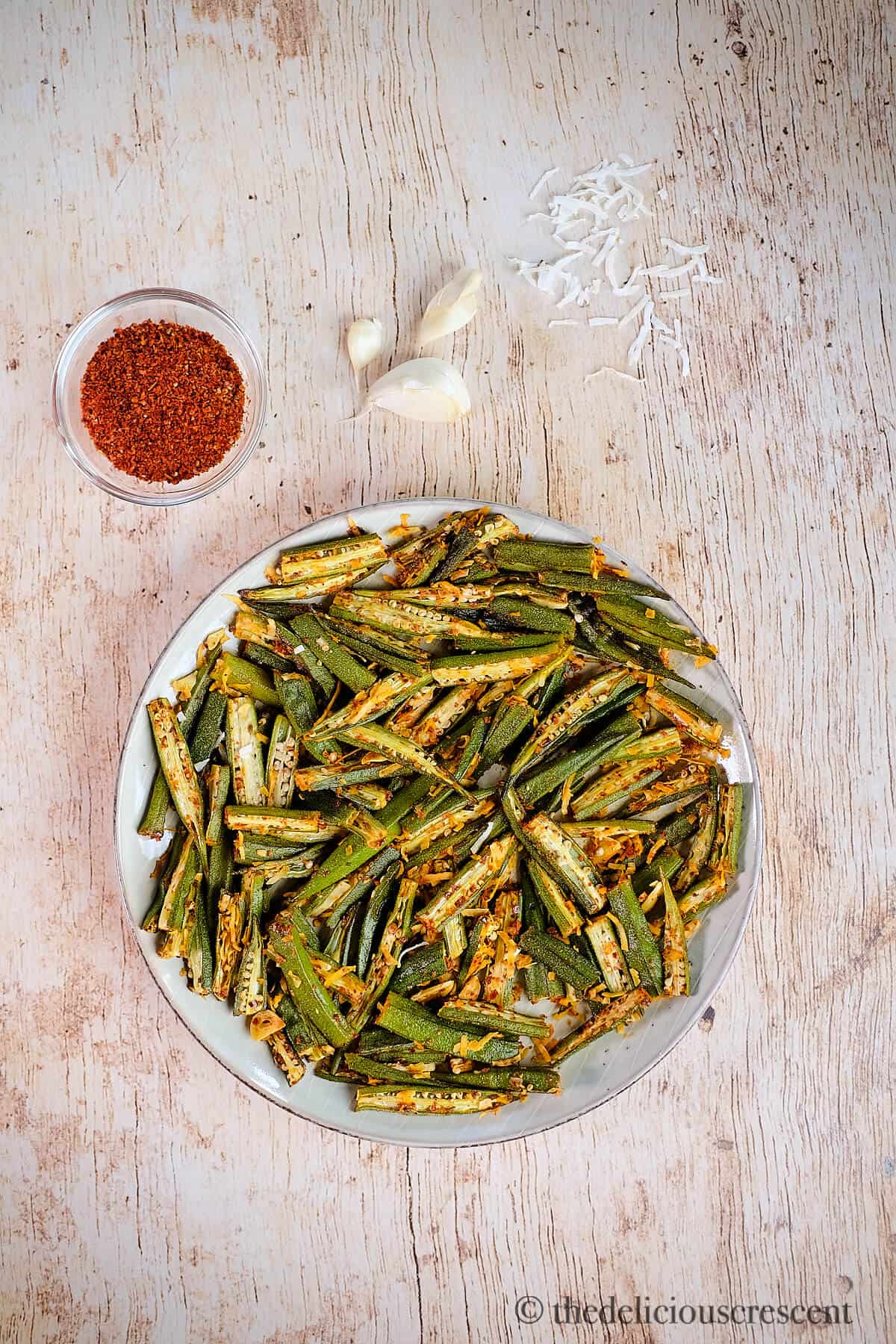 Indian style roasted okra served on a table.