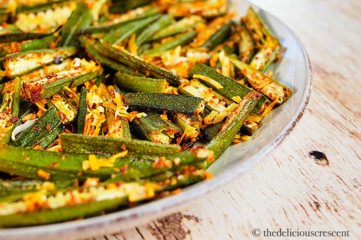 Spicy oven roasted okra in a plate.