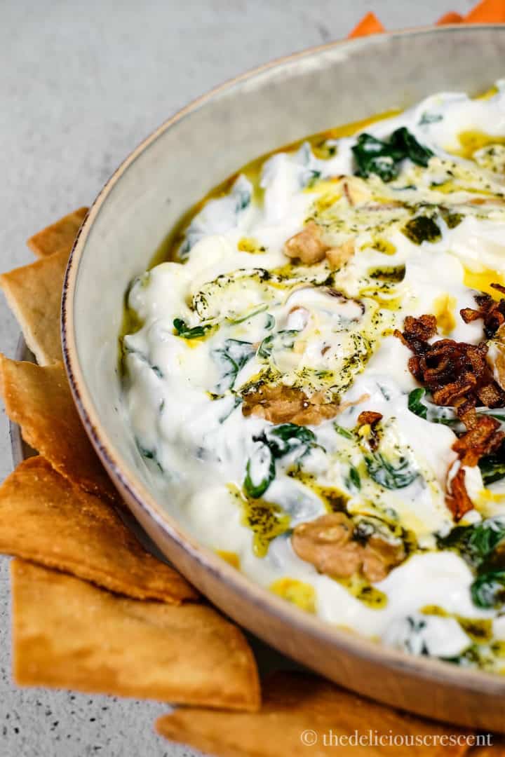 Persian spinach dip with sizzled mint on top.