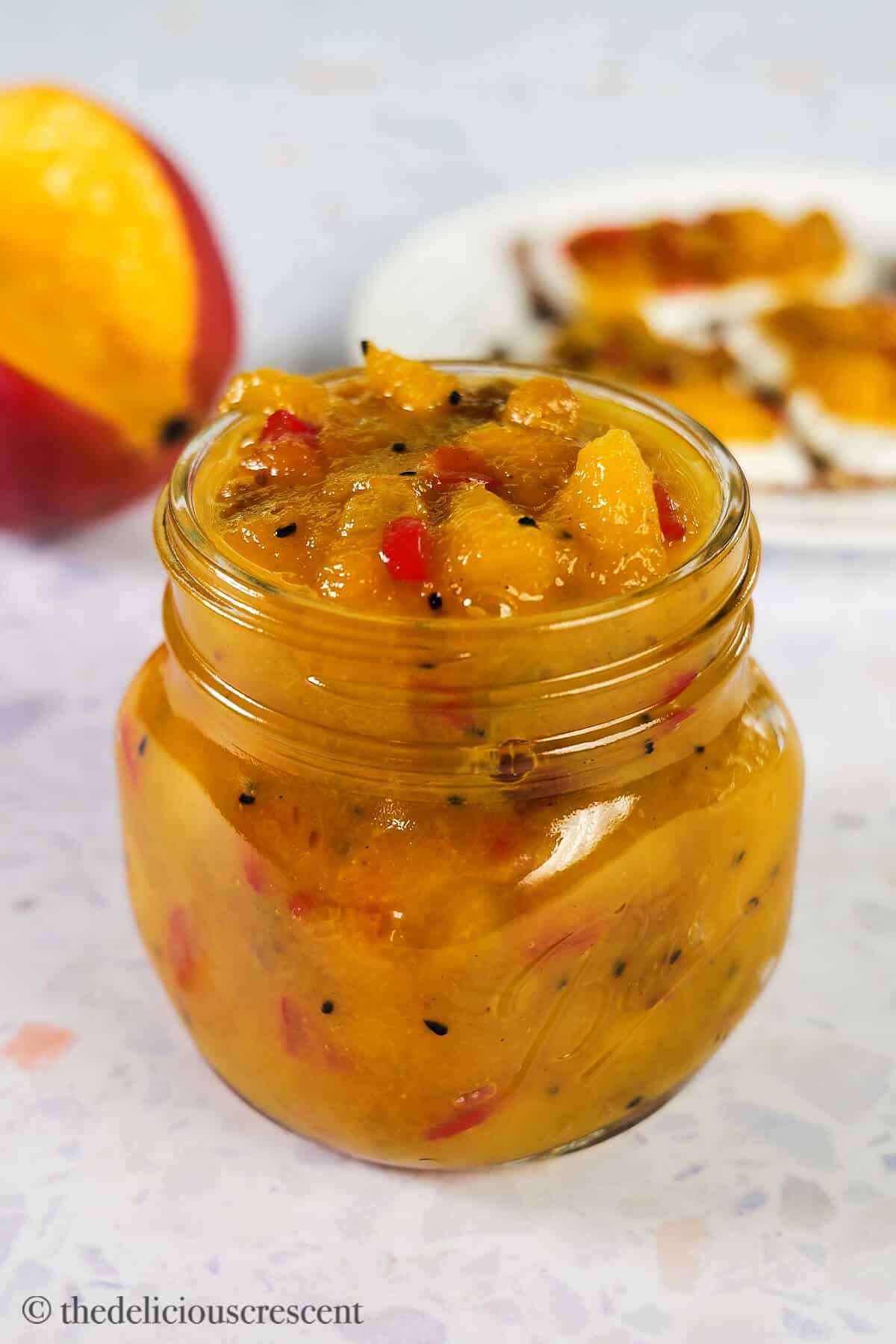 Mango chutney filled in a jar.