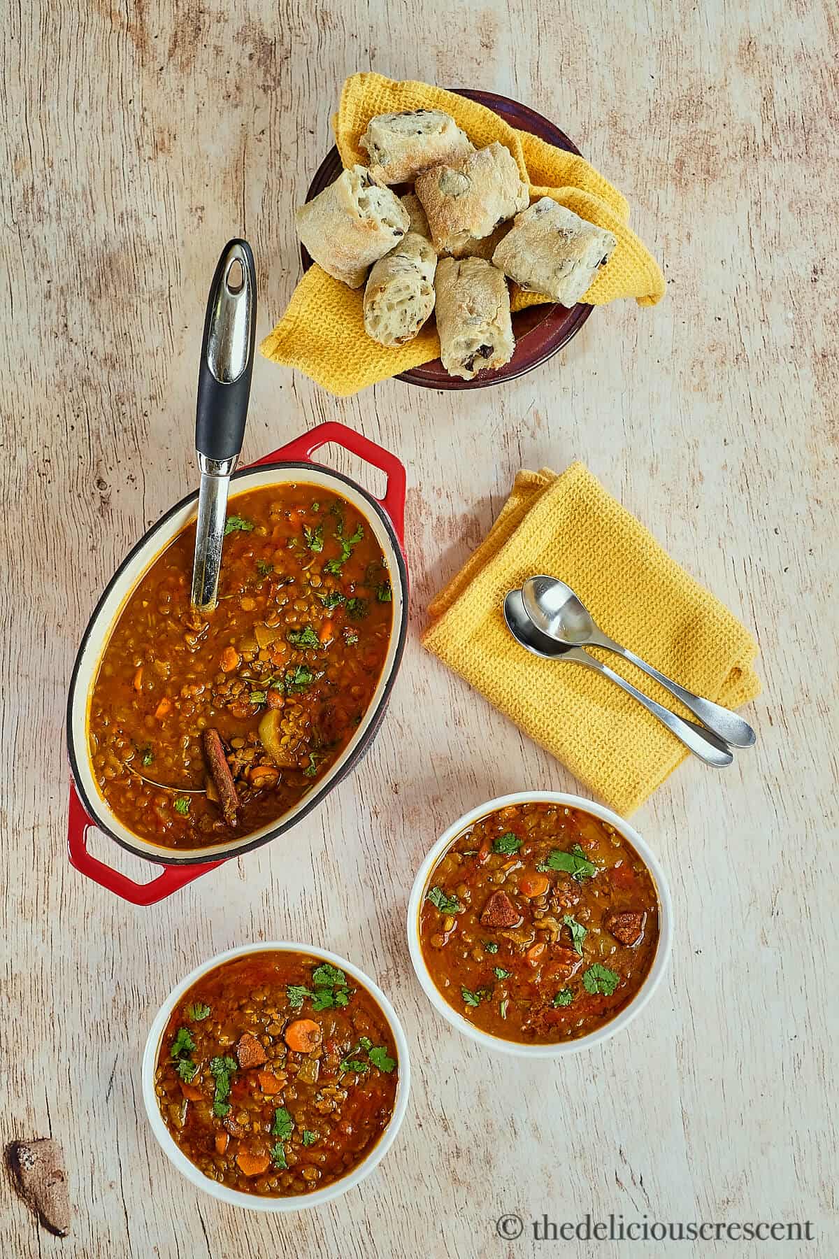 Hot soup on the table with bread.