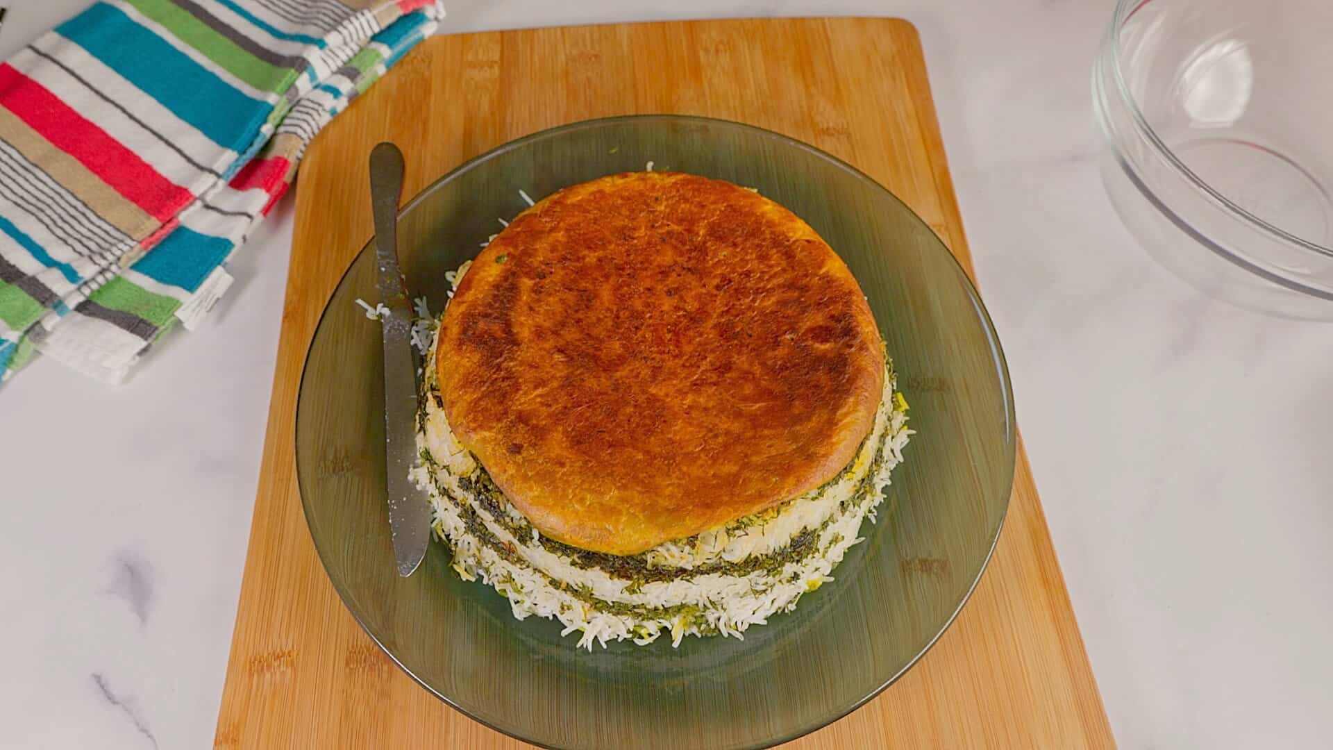 Persian herb rice served with crust on top.