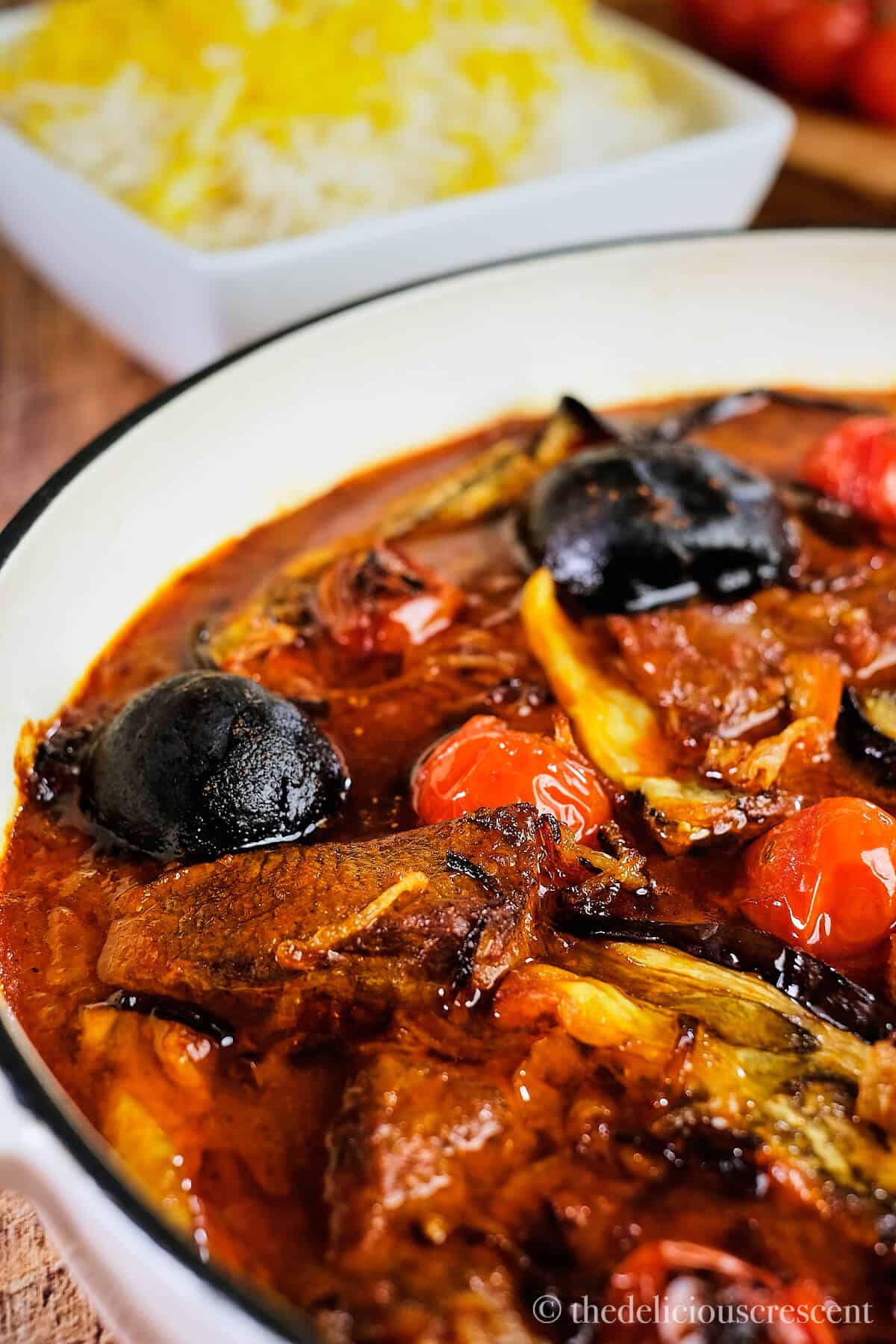 Eggplant stew cooked in Persian style and served on table.