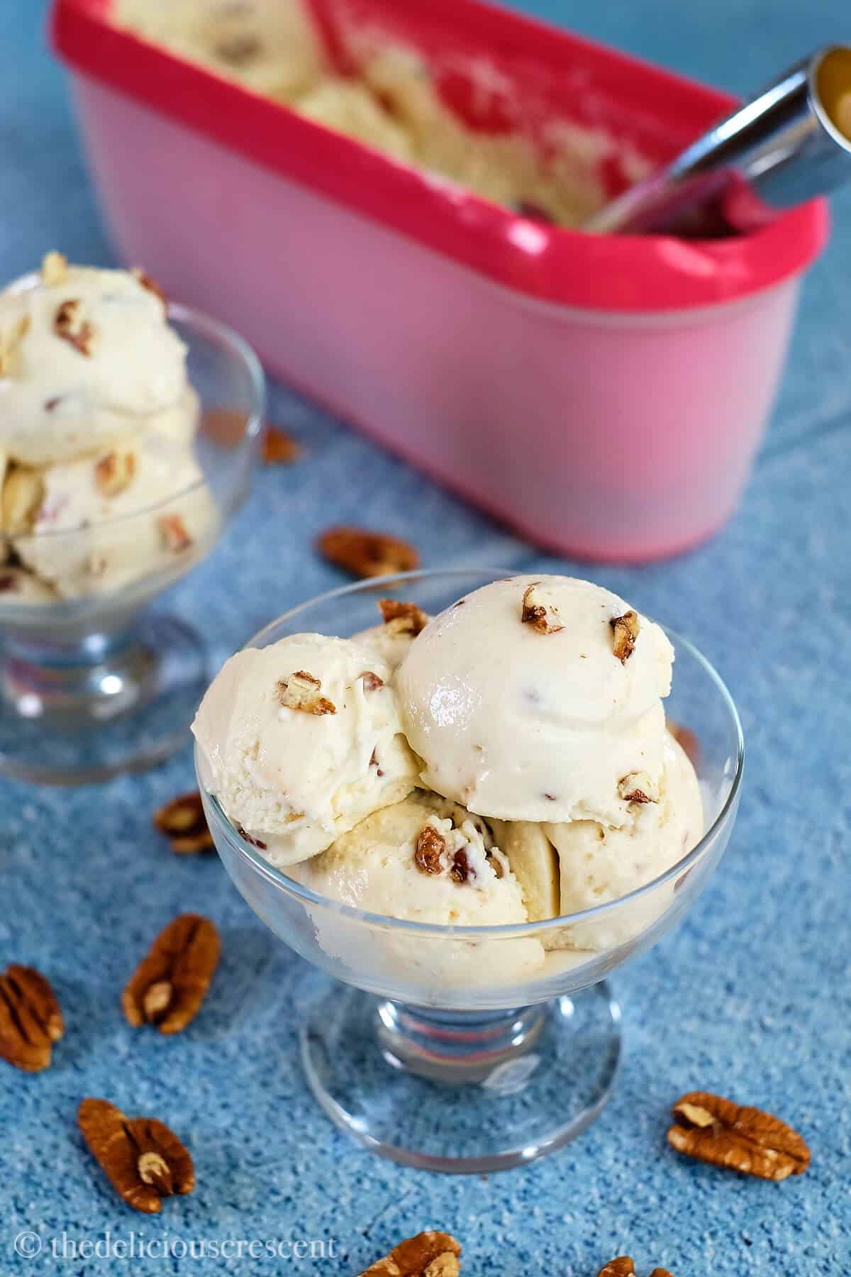 Homemade ice cream in bowl and tub.