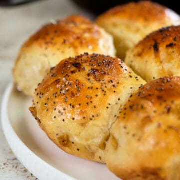 Close view of onion rolls served on the table.