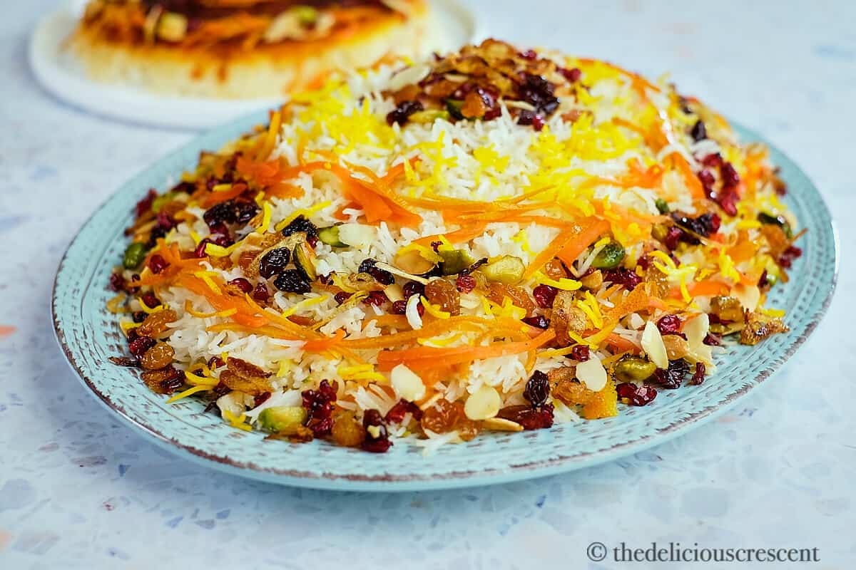 Persian jeweled rice and the crust placed on the table.