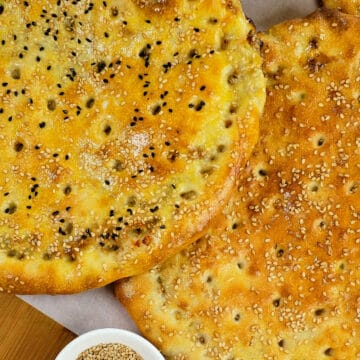 Close view of two keema naan arranged together.