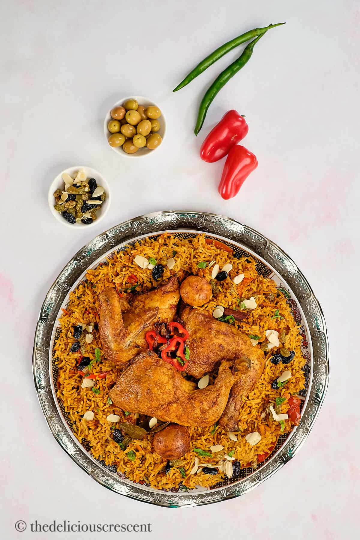 Top view of Arabian rice with browned aromatic chicken.