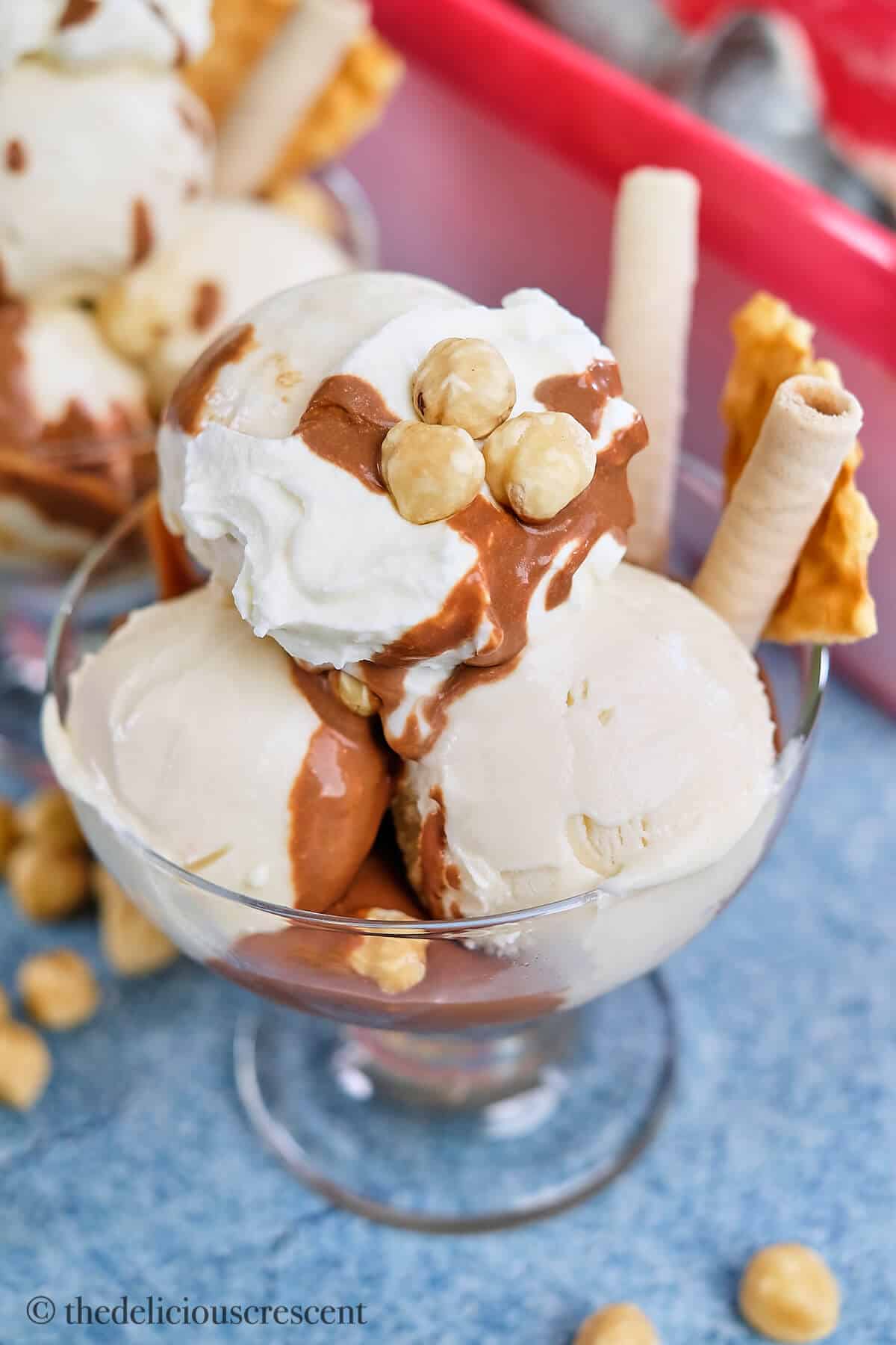 Hazelnut gelato served with toppings.