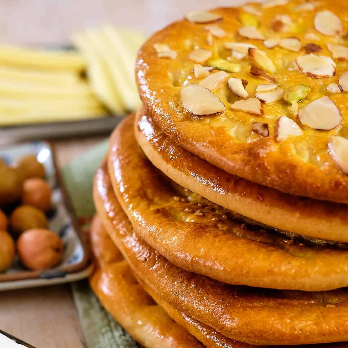 Close view of rich and subtly sweet flatbreads stacked together.