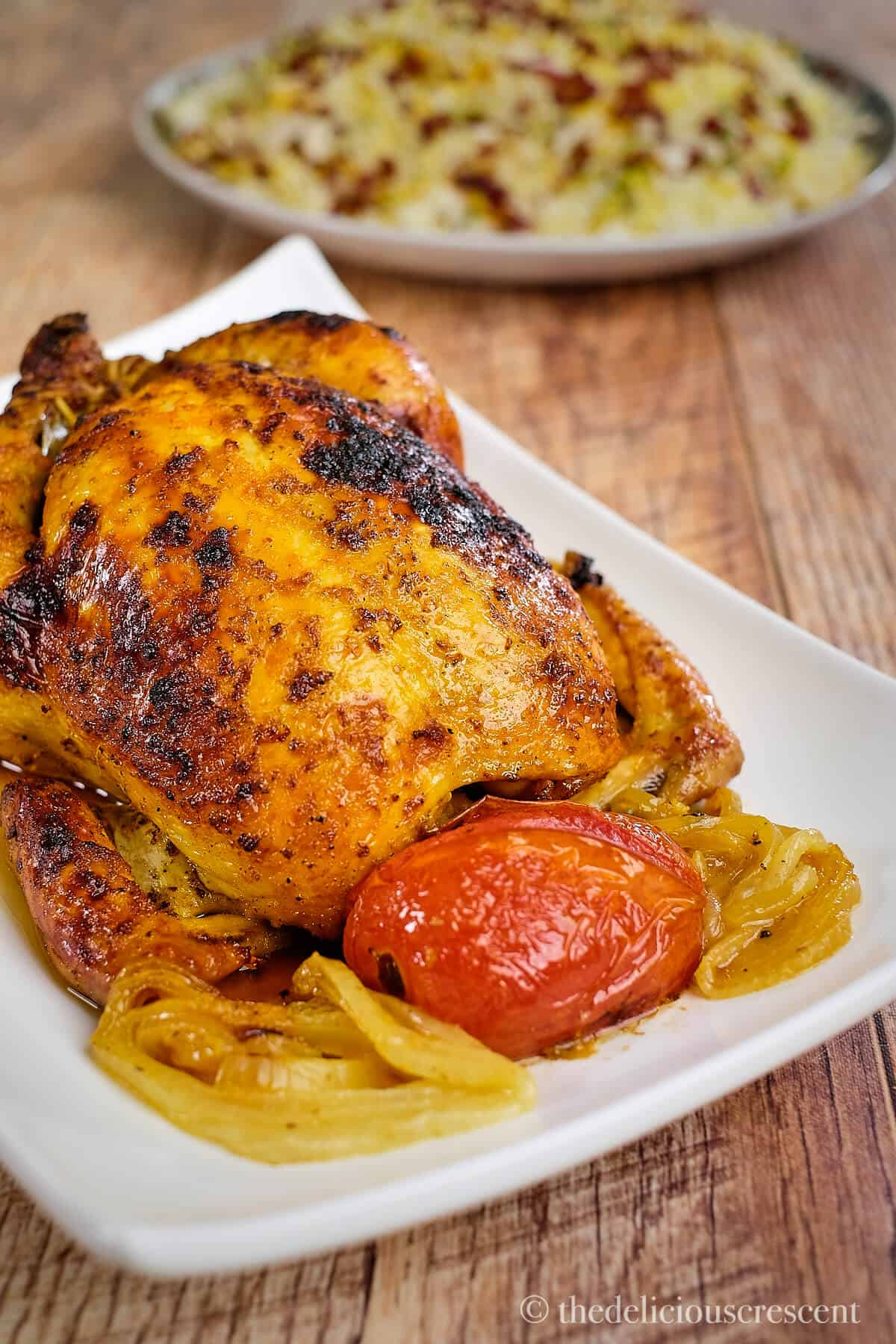 Roast chicken prepared with saffron marinade.