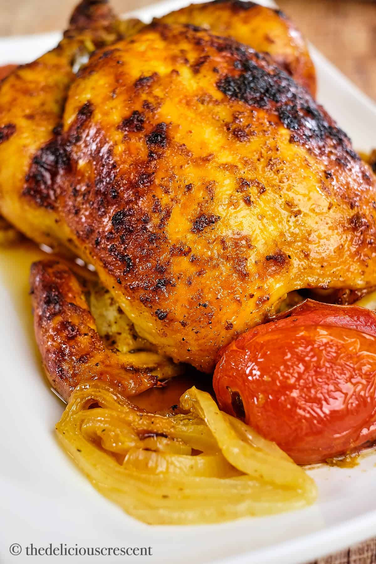 Saffron infused chicken roasted and served.