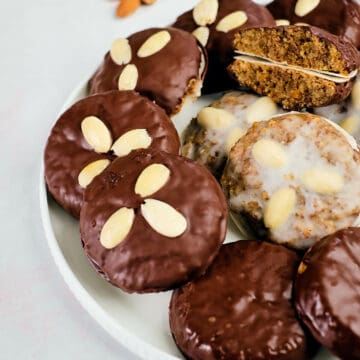 Close view of lebkuchen arranged in a white plate.