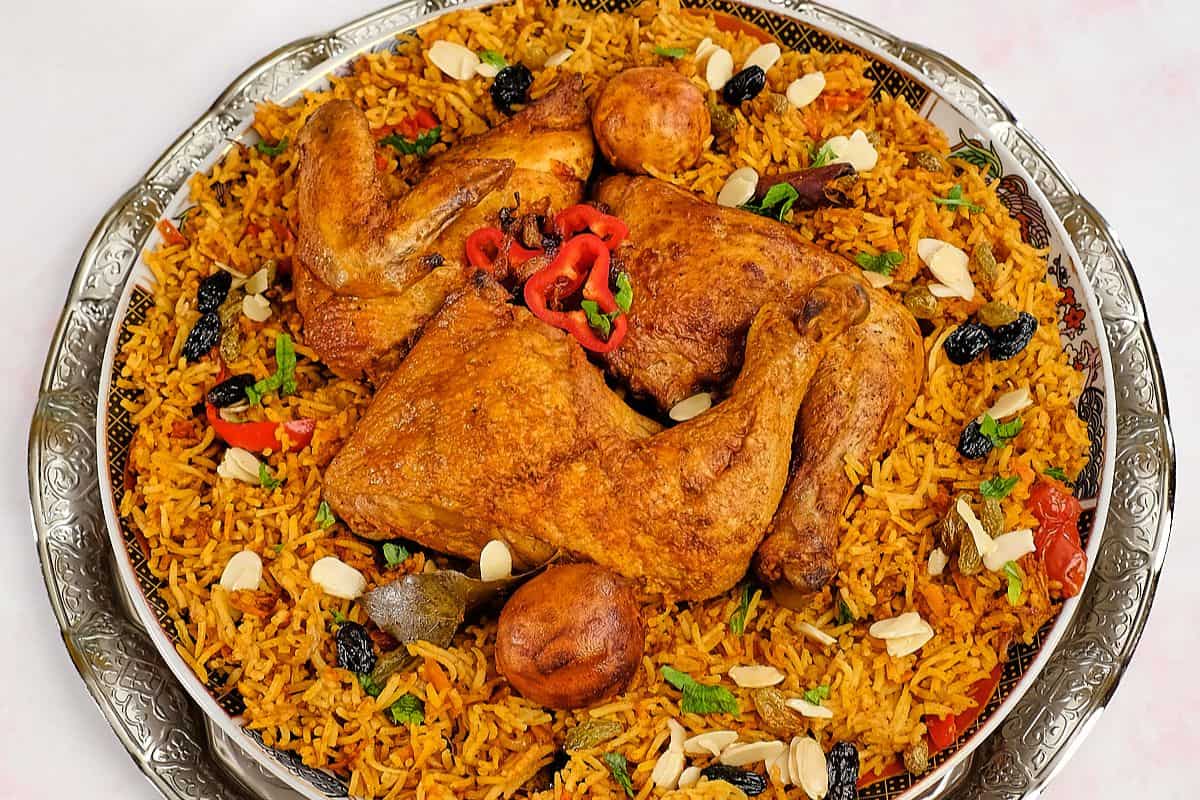 Kabsa with chicken in a plate for dinner.
