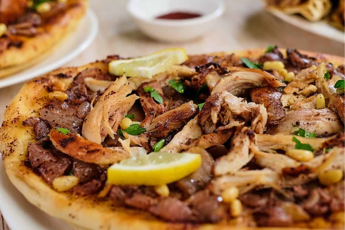 Sumac chicken flatbread in a plate.