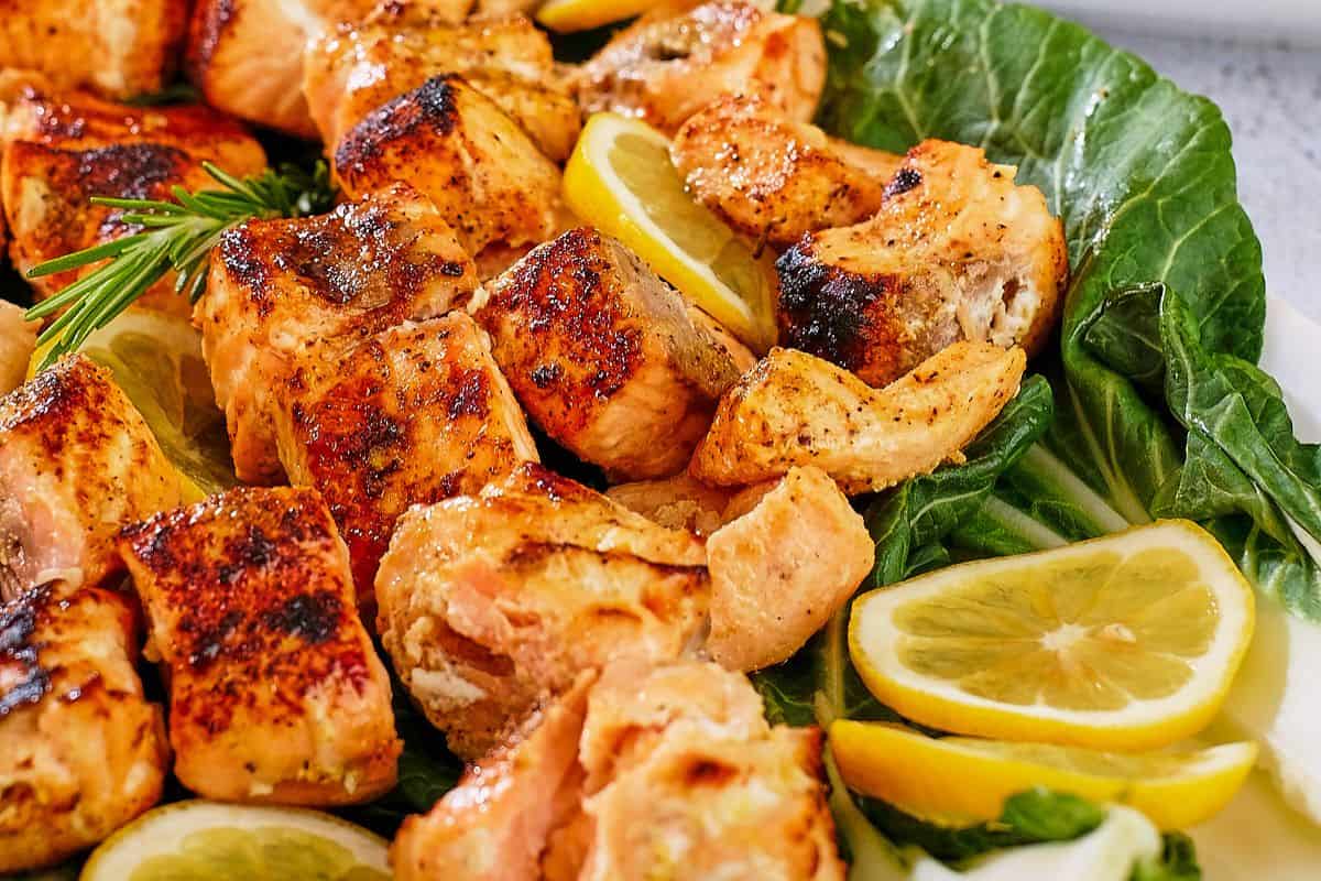Close view of Persian style grilled salmon kabobs.