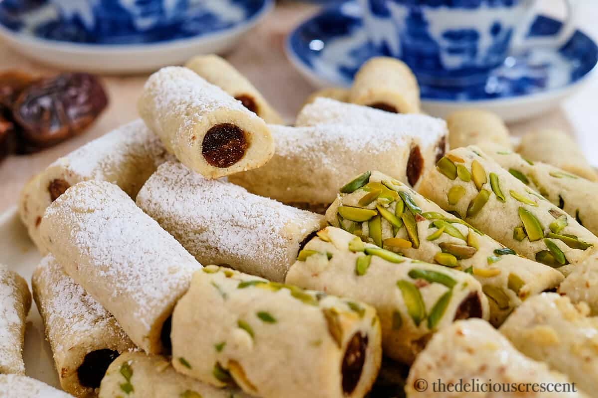 Date filled cookie rolls served with tea.