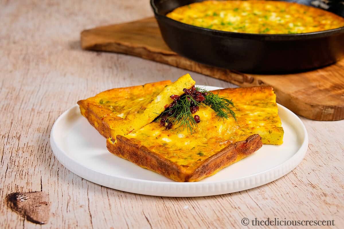 Yogurt egg bake slices in a white plate.