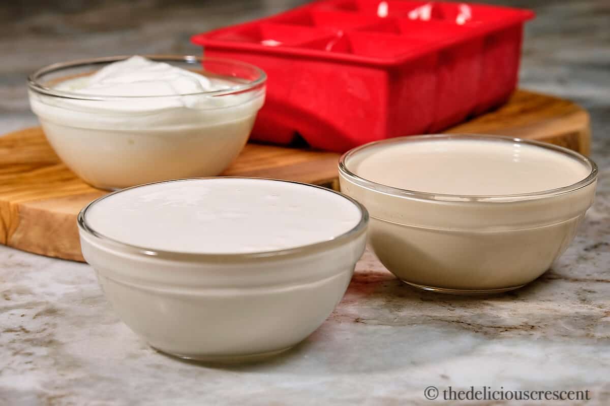 Glass bowls with kashk, a concentrated Persian yogurt condiment